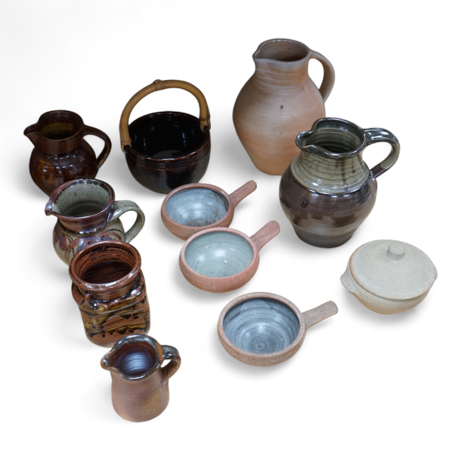 A large group of 20th century signed and unsigned Studio pottery, tallest 23cm high